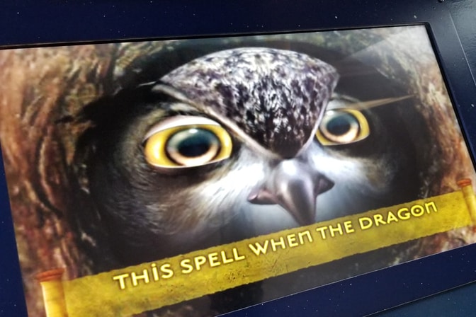 A screen with an owl face and the the words "this spell when the dragon"